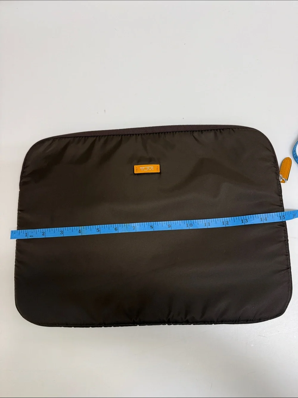 Tumi Brown Laptop Sleeve with Orange Logo Accent